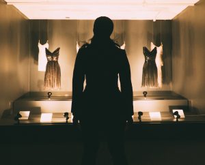 LBJackson silhouette in front of fashion exhibit
